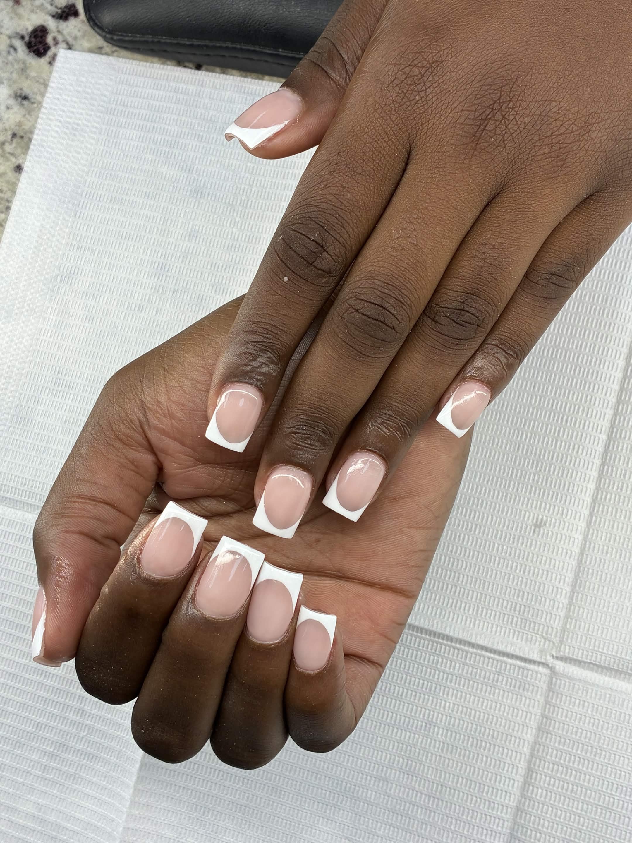 Classic white French tip manicure